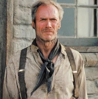 Clint Eastwood w jednej ze swoich ikonicznych ról filmowych, ukazujący intensywność i charyzmę aktora.